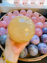 Load image into Gallery viewer, Moon Rituals - Radiant Honey Calcite Sphere | Natural Golden Yellow Calcite Crystal for Joy & Confidence