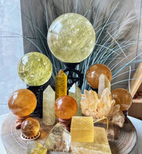 Load image into Gallery viewer, Moon Rituals - Radiant Honey Calcite Sphere | Natural Golden Yellow Calcite Crystal for Joy &amp; Confidence

