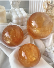 Load image into Gallery viewer, Moon Rituals - Radiant Honey Calcite Sphere | Natural Golden Yellow Calcite Crystal for Joy &amp; Confidence

