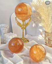 Load image into Gallery viewer, Moon Rituals - Radiant Honey Calcite Sphere | Natural Golden Yellow Calcite Crystal for Joy &amp; Confidence
